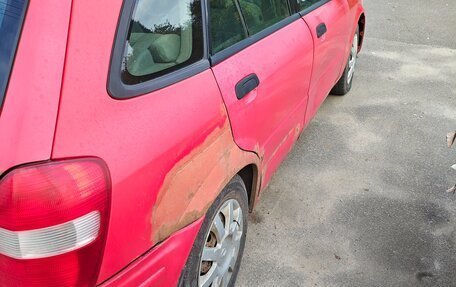 Mazda 323, 1999 год, 140 000 рублей, 4 фотография