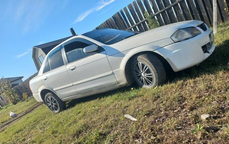 Mazda Familia, 1999 год, 230 000 рублей, 7 фотография