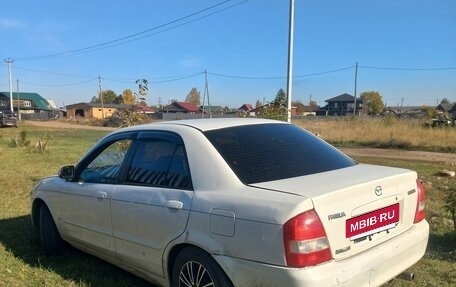 Mazda Familia, 1999 год, 230 000 рублей, 9 фотография