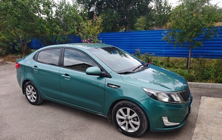KIA Rio III рестайлинг, 2012 год, 650 000 рублей, 2 фотография