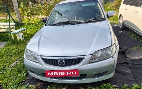 Mazda Familia, 2002 год, 1 фотография