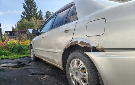Mazda Familia, 2002 год, 3 фотография