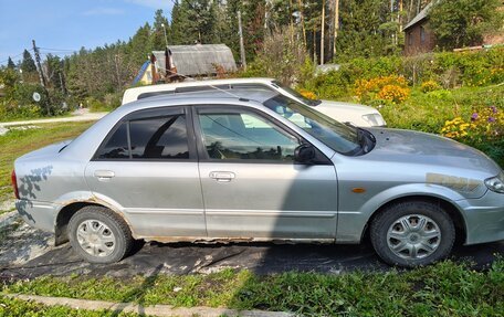 Mazda Familia, 2002 год, 6 фотография