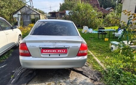 Mazda Familia, 2002 год, 4 фотография