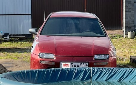 Mazda 323, 1998 год, 170 000 рублей, 11 фотография