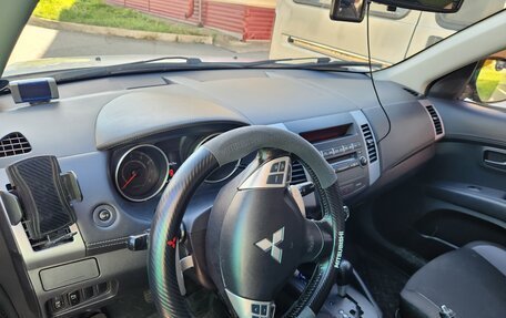 Mitsubishi Outlander III рестайлинг 3, 2011 год, 1 100 000 рублей, 19 фотография