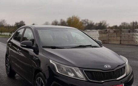 KIA Rio III рестайлинг, 2011 год, 950 000 рублей, 2 фотография