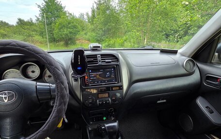 Toyota RAV4, 2003 год, 1 050 000 рублей, 23 фотография