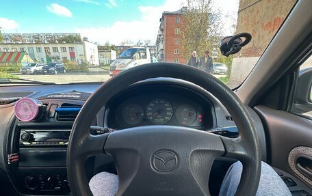 Mazda Familia, 1999 год, 230 000 рублей, 13 фотография