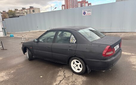 Mitsubishi Lancer VII, 1997 год, 65 000 рублей, 7 фотография