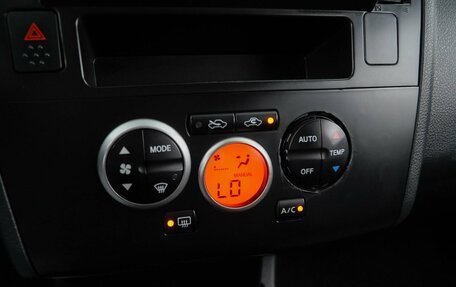 Nissan Tiida, 2011 год, 649 077 рублей, 14 фотография