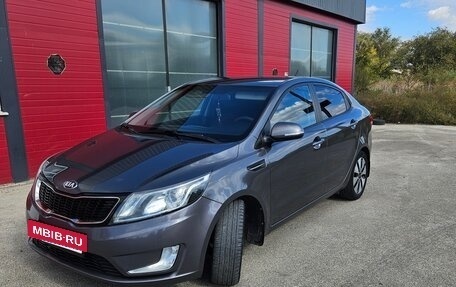 KIA Rio III рестайлинг, 2013 год, 1 050 000 рублей, 2 фотография