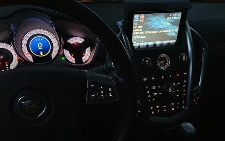 Cadillac SRX II рестайлинг, 2011 год, 960 000 рублей, 21 фотография