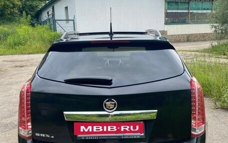 Cadillac SRX II рестайлинг, 2011 год, 980 000 рублей, 4 фотография