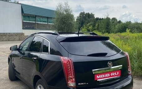 Cadillac SRX II рестайлинг, 2011 год, 980 000 рублей, 3 фотография