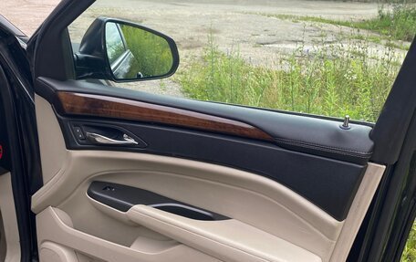Cadillac SRX II рестайлинг, 2011 год, 980 000 рублей, 21 фотография