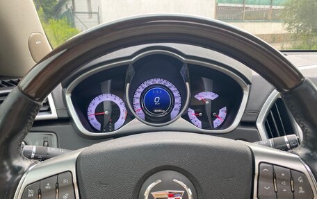 Cadillac SRX II рестайлинг, 2011 год, 980 000 рублей, 24 фотография