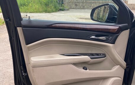Cadillac SRX II рестайлинг, 2011 год, 980 000 рублей, 23 фотография