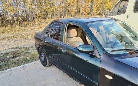 Mazda Protege, 2003 год, 300 000 рублей, 13 фотография