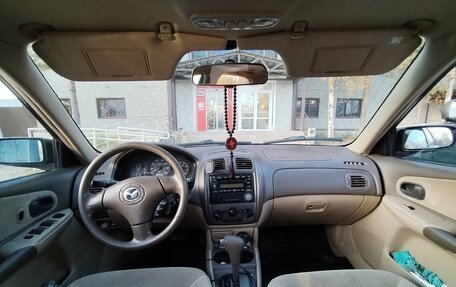 Mazda Protege, 2003 год, 300 000 рублей, 17 фотография