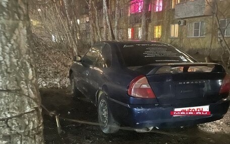 Mitsubishi Mirage VI рестайлинг, 1998 год, 60 000 рублей, 11 фотография
