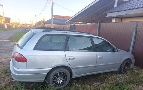 Toyota Avensis III рестайлинг, 2001 год, 299 000 рублей, 8 фотография