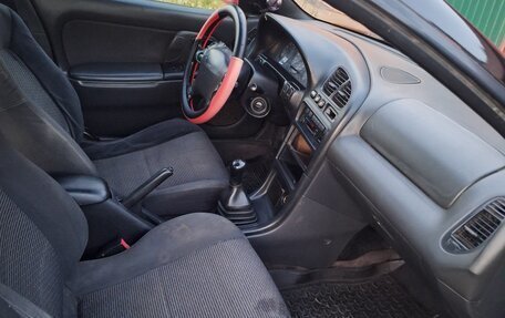 Mazda 323, 1996 год, 170 000 рублей, 13 фотография