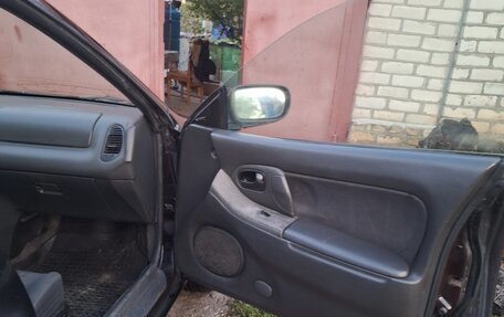 Mazda 323, 1996 год, 170 000 рублей, 12 фотография