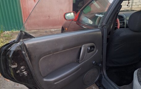Mazda 323, 1996 год, 170 000 рублей, 14 фотография