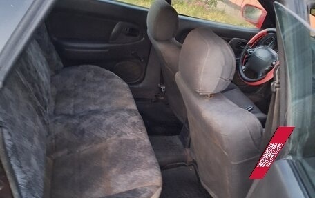 Mazda 323, 1996 год, 170 000 рублей, 11 фотография