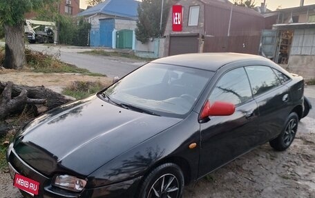 Mazda 323, 1996 год, 170 000 рублей, 9 фотография