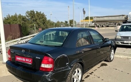 Mazda Protege, 2002 год, 99 000 рублей, 1 фотография
