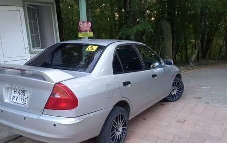 Mitsubishi Mirage VI рестайлинг, 1997 год, 195 000 рублей, 3 фотография