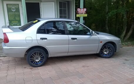 Mitsubishi Mirage VI рестайлинг, 1997 год, 195 000 рублей, 6 фотография