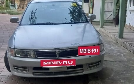 Mitsubishi Mirage VI рестайлинг, 1997 год, 195 000 рублей, 11 фотография