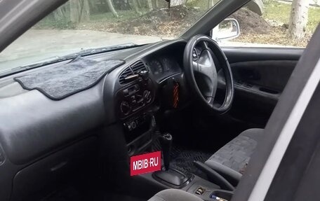Mitsubishi Mirage VI рестайлинг, 1997 год, 195 000 рублей, 7 фотография