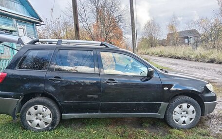 Mitsubishi Outlander III рестайлинг 3, 2007 год, 400 000 рублей, 12 фотография