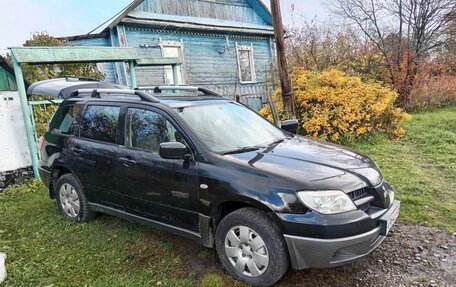 Mitsubishi Outlander III рестайлинг 3, 2007 год, 400 000 рублей, 13 фотография