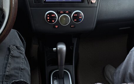 Nissan Tiida, 2010 год, 850 000 рублей, 4 фотография
