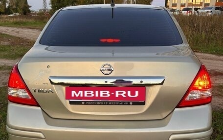 Nissan Tiida, 2010 год, 850 000 рублей, 3 фотография