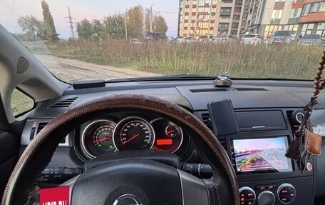 Nissan Tiida, 2010 год, 850 000 рублей, 6 фотография