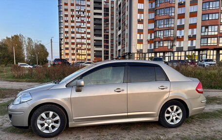 Nissan Tiida, 2010 год, 850 000 рублей, 21 фотография
