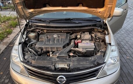 Nissan Tiida, 2010 год, 850 000 рублей, 26 фотография