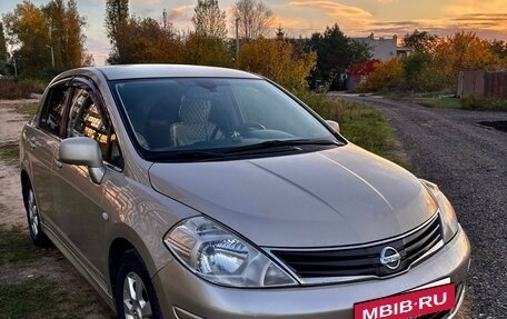 Nissan Tiida, 2010 год, 850 000 рублей, 25 фотография