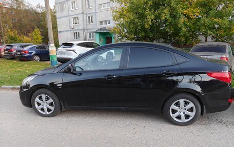 Hyundai Solaris II рестайлинг, 2011 год, 700 000 рублей, 10 фотография