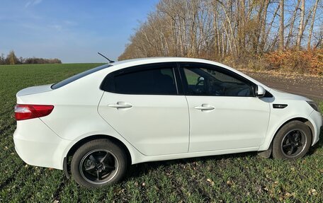 KIA Rio III рестайлинг, 2013 год, 850 000 рублей, 10 фотография