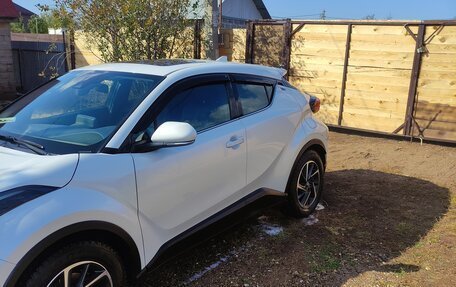 Toyota C-HR I рестайлинг, 2021 год, 2 600 000 рублей, 8 фотография