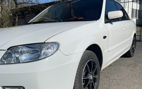 Mazda Familia, 2002 год, 310 000 рублей, 11 фотография