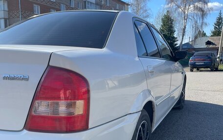 Mazda Familia, 2002 год, 310 000 рублей, 7 фотография