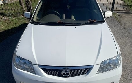 Mazda Familia, 2002 год, 310 000 рублей, 9 фотография